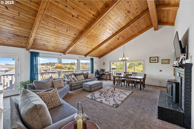 2144 Hamilton St, North Bend, OR 97459 - living room featuring high vaulted ceiling, carpet, beamed ceiling, a chandelier, and wooden ceiling