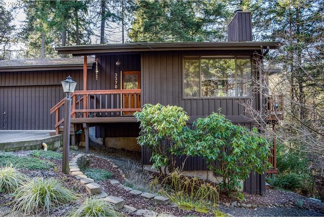 exterior space featuring a wooden deck