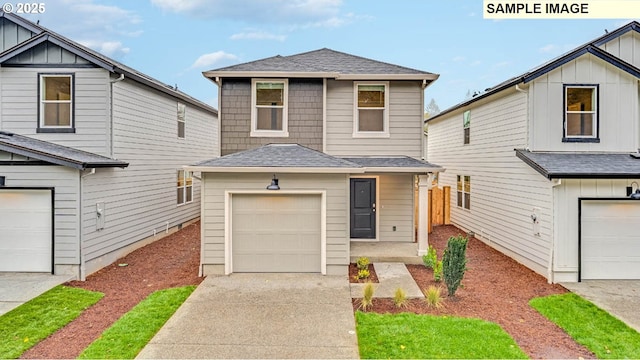 view of front of property featuring a garage