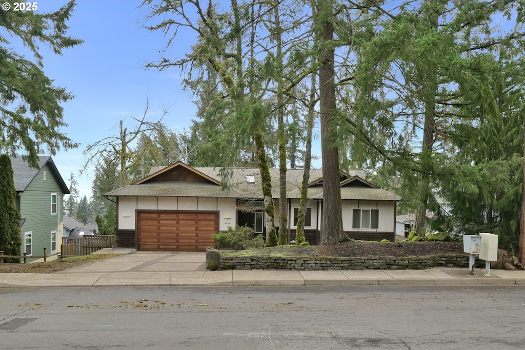 ranch-style home with a garage