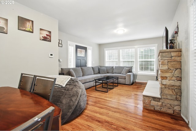 8535 SW Oleson Rd, Portland, OR 97223 - living room featuring baseboards and light wood-type flooring