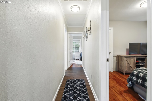 8535 SW Oleson Rd, Portland, OR 97223 - corridor featuring crown molding, a textured wall, baseboards, and wood finished floors
