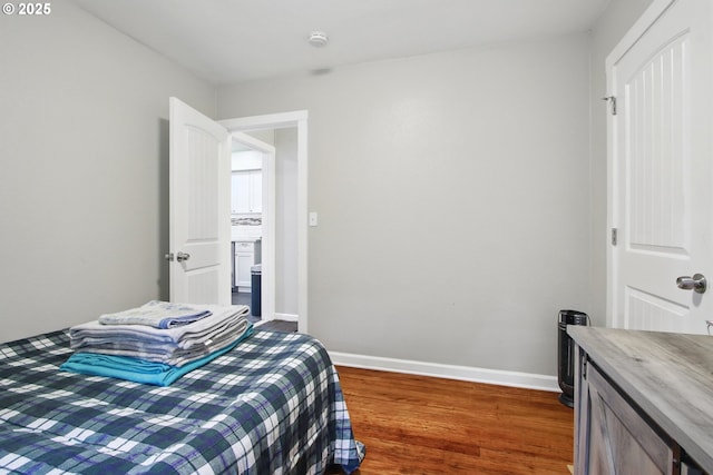 8535 SW Oleson Rd, Portland, OR 97223 - bedroom featuring baseboards and wood finished floors