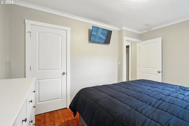 8535 SW Oleson Rd, Portland, OR 97223 - bedroom with ornamental molding and wood finished floors