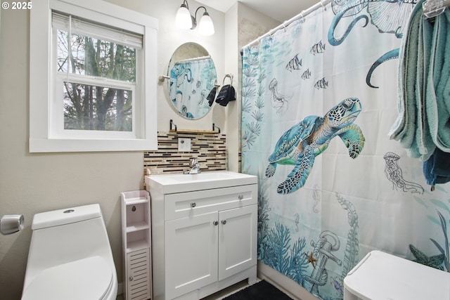 8535 SW Oleson Rd, Portland, OR 97223 - bathroom with toilet, backsplash, vanity, and curtained shower