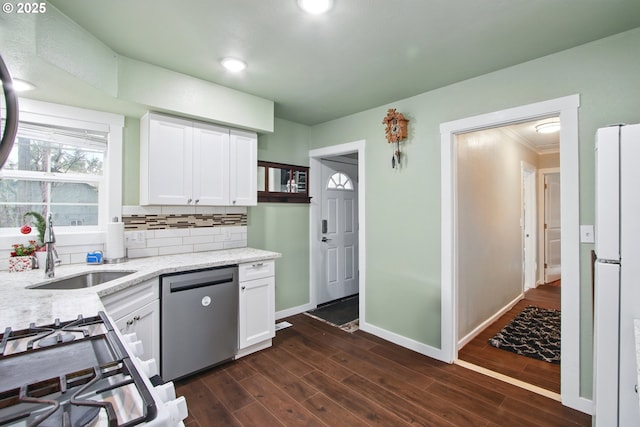 8535 SW Oleson Rd, Portland, OR 97223 - kitchen with gas range, a sink, stainless steel dishwasher, and white cabinets