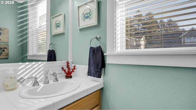 2781 SW Coast Ave, Lincoln City, OR 97367 - bathroom with vanity and a textured wall