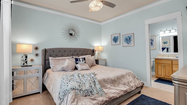 2781 SW Coast Ave, Lincoln City, OR 97367 - bedroom with ornamental molding, a sink, ensuite bathroom, ceiling fan, and light tile patterned floors
