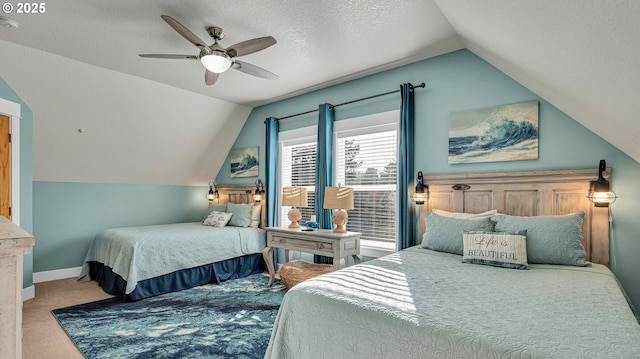 2781 SW Coast Ave, Lincoln City, OR 97367 - bedroom featuring lofted ceiling, carpet, baseboards, ceiling fan, and a textured ceiling