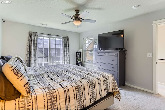 768 NE 70th Ave, Hillsboro, OR 97124 - bedroom with baseboards, light colored carpet, and ceiling fan