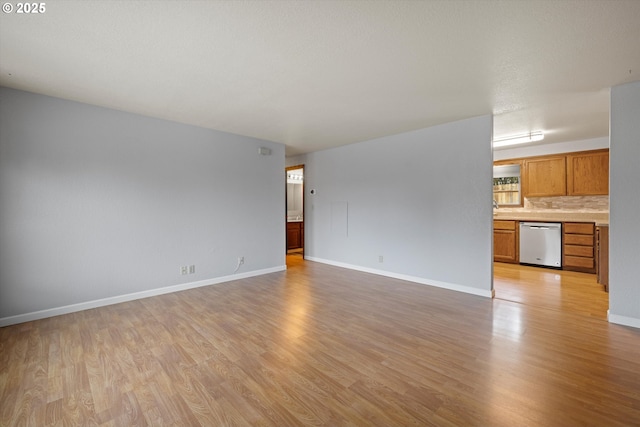 unfurnished living room featuring light hardwood / wood-style floors