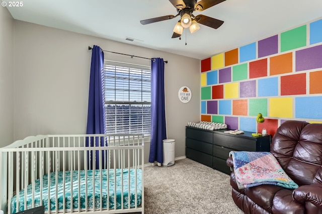 carpeted bedroom featuring ceiling fan