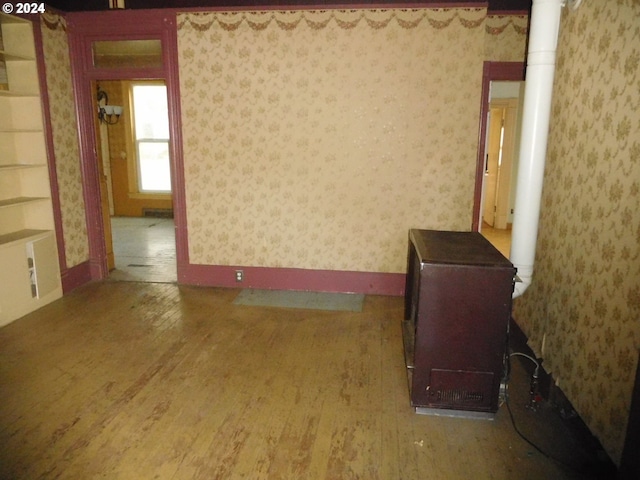 spare room featuring hardwood / wood-style floors