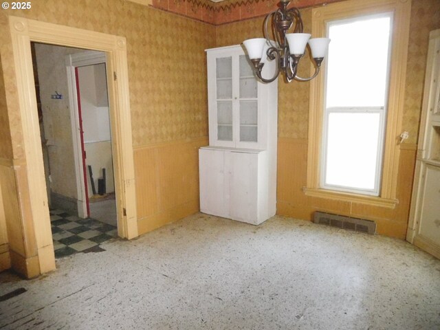 kitchen featuring water heater and sink