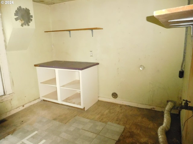 washroom with wood-type flooring