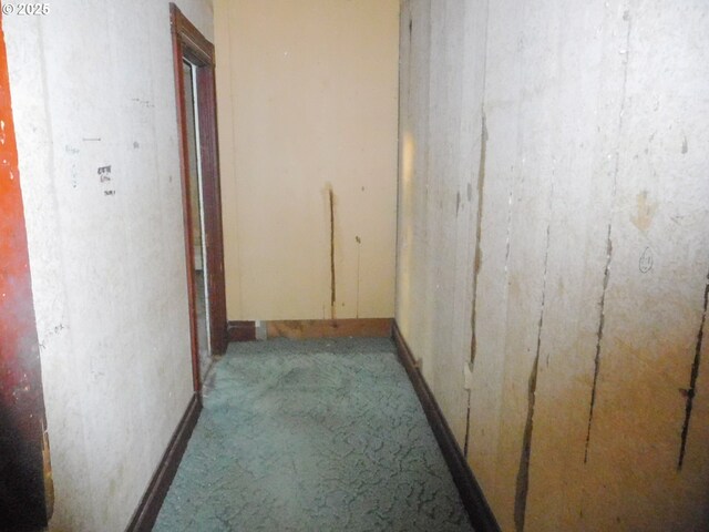 empty room with wooden walls