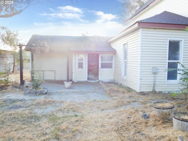 exterior space with a yard and covered porch