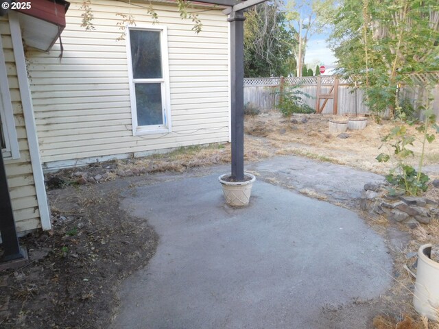 rear view of house with a pergola and a patio area