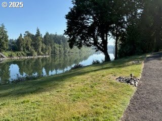 8515 SW Curry Dr Unit D, Wilsonville, OR 97070 - view of green lawn with a water view and a wooded view