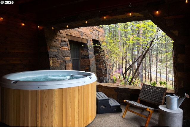 view of patio with a hot tub