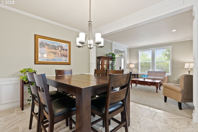 16041 NW Trakehner Way, Portland, OR 97229 - dining space featuring ornamental molding, a chandelier, and stone tile flooring