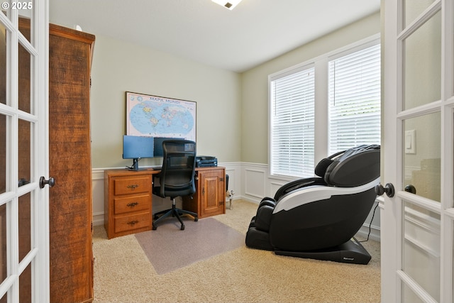 16041 NW Trakehner Way, Portland, OR 97229 - carpeted home office with french doors, wainscoting, and a decorative wall