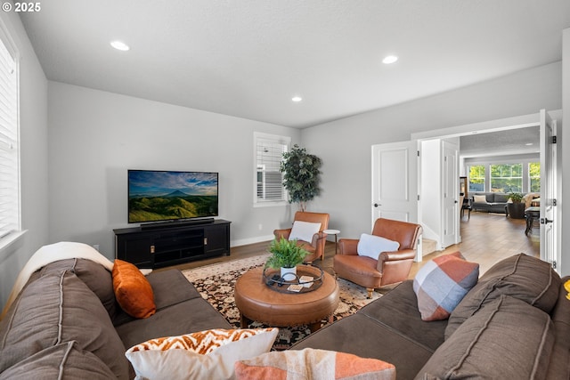 16849 SW Friendly Ln, Beaverton, OR 97007 - living room with wood finished floors, recessed lighting, and baseboards