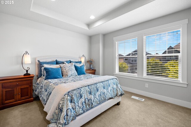 16849 SW Friendly Ln, Beaverton, OR 97007 - bedroom with carpet flooring, baseboards, a tray ceiling, and recessed lighting