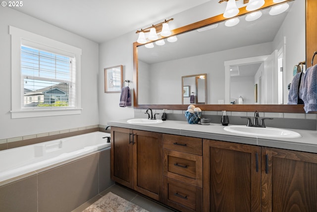 16849 SW Friendly Ln, Beaverton, OR 97007 - bathroom with a garden tub, double vanity, and tile patterned floors