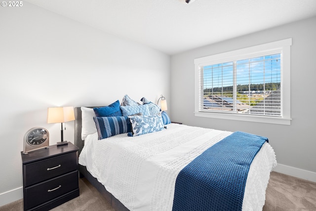 16849 SW Friendly Ln, Beaverton, OR 97007 - carpeted bedroom featuring baseboards