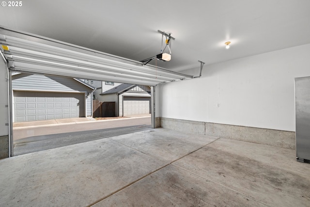 16849 SW Friendly Ln, Beaverton, OR 97007 - garage featuring a garage door opener