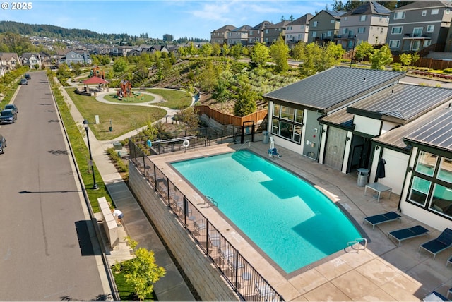 16849 SW Friendly Ln, Beaverton, OR 97007 - community pool with a residential view, fence, and a patio