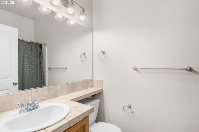 1020 SW 170th Ave Unit 203, Beaverton, OR 97003 - bathroom with vanity, toilet, and a shower with shower curtain