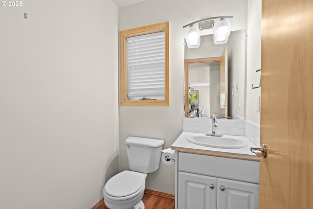 6309 NE 45th Ave, Portland, OR 97218 - bathroom featuring vanity, toilet, and wood finished floors