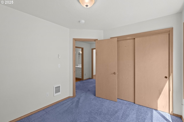 6309 NE 45th Ave, Portland, OR 97218 - unfurnished bedroom featuring carpet, baseboards, and a closet