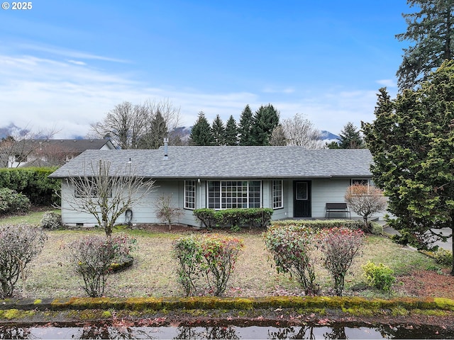 single story home with a shingled roof and crawl space