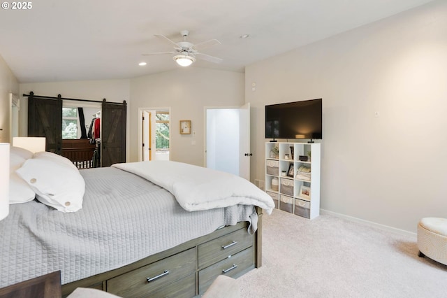 18020 SE 370th Ave, Sandy, OR 97055 - carpeted bedroom with baseboards, lofted ceiling, ceiling fan, a barn door, and recessed lighting