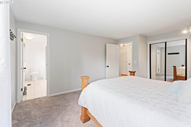 18020 SE 370th Ave, Sandy, OR 97055 - carpeted bedroom with connected bathroom, a closet, and baseboards