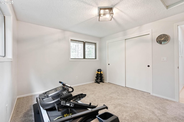 18020 SE 370th Ave, Sandy, OR 97055 - exercise area featuring carpet, a textured ceiling, and baseboards