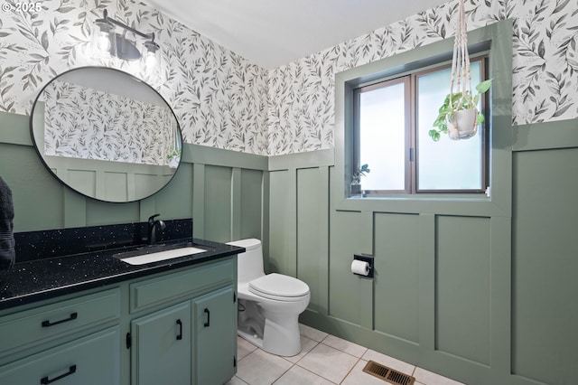 18020 SE 370th Ave, Sandy, OR 97055 - bathroom featuring wallpapered walls, a wainscoted wall, tile patterned flooring, toilet, and vanity