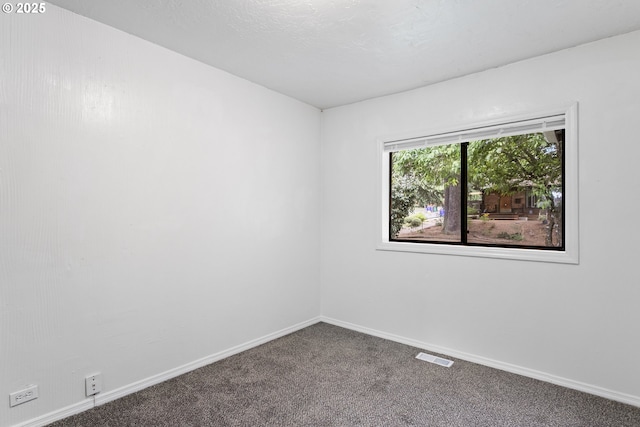 7733 NE Mason St, Portland, OR 97218 - spare room featuring carpet floors and baseboards