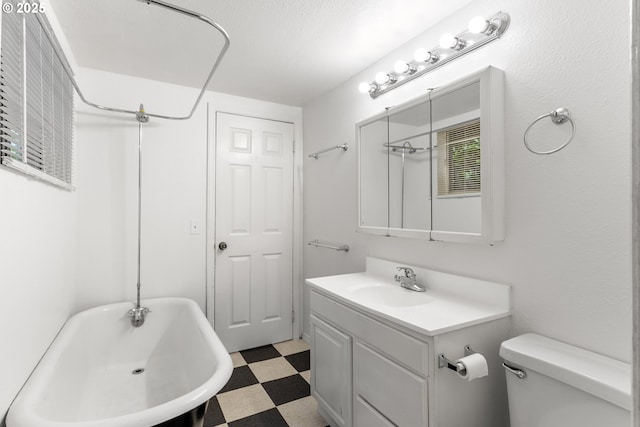 7733 NE Mason St, Portland, OR 97218 - full bath featuring tile patterned floors, a soaking tub, vanity, and a shower