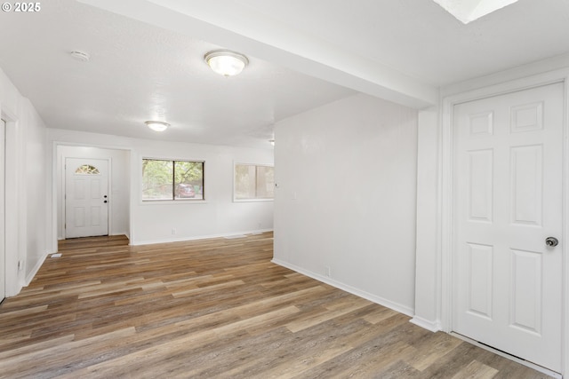 7733 NE Mason St, Portland, OR 97218 - spare room featuring wood finished floors and a smoke detector