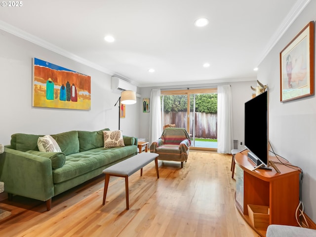 living area with a wall mounted air conditioner, light wood-style floors, recessed lighting, and crown molding