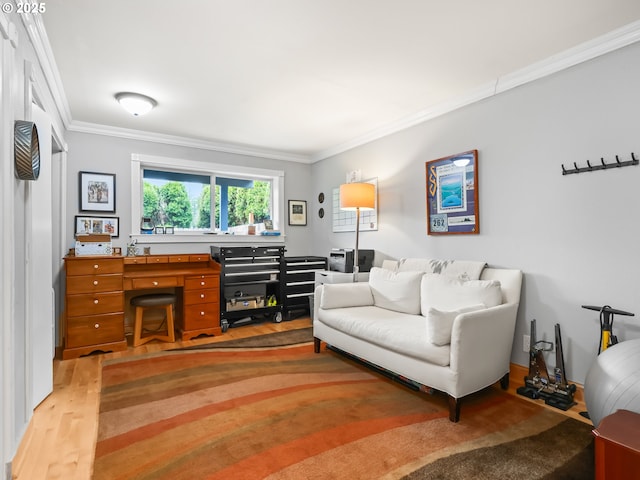 living room featuring light wood-type flooring and ornamental molding