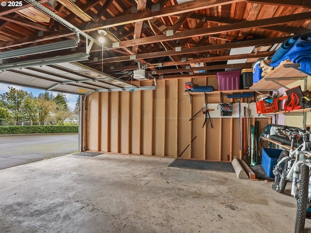 garage featuring a garage door opener