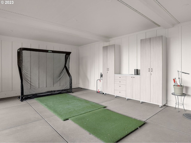 basement featuring golf simulator