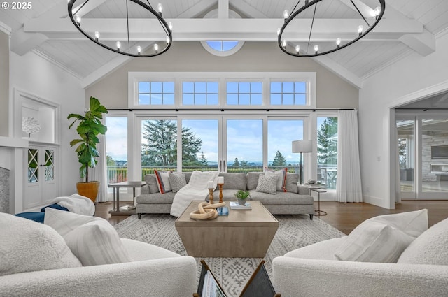 living room with an inviting chandelier, wooden ceiling, wood-type flooring, and beamed ceiling