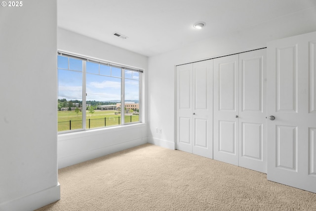 736 NW 118th Ave Unit 102, Portland, OR 97229 - unfurnished bedroom with carpet and a closet