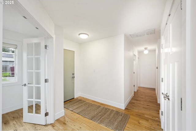 25 SW 143rd Ave, Beaverton, OR 97006 - corridor with light wood finished floors and baseboards